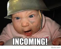 Baby Colonel found here: http://9lols.com/tag/funniest-random-baby/